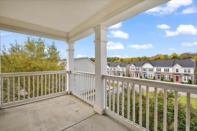 a view of a balcony with city view