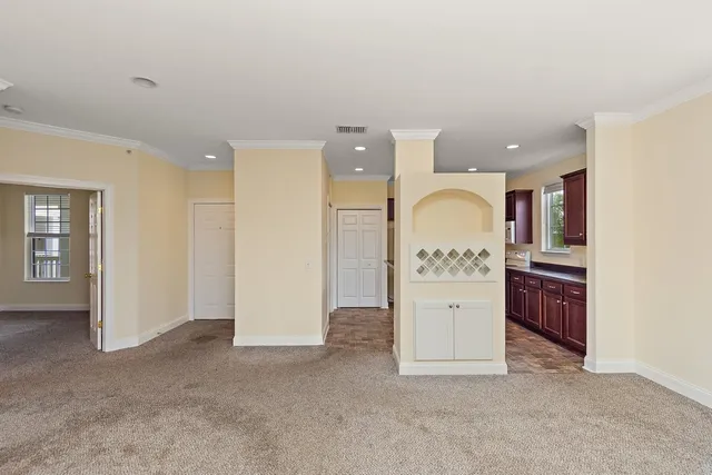a view of a kitchen with a sink