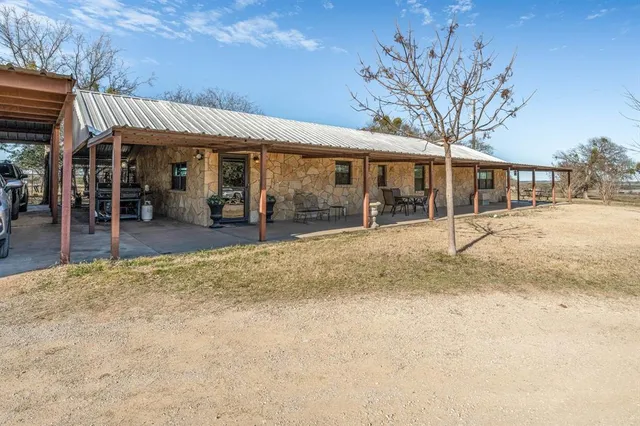 a view of a house with a patio