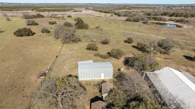 a view of a swimming pool with a terrace