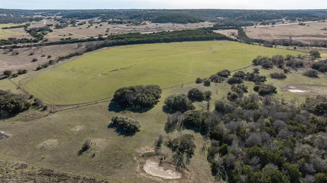 a view of a lake with beach