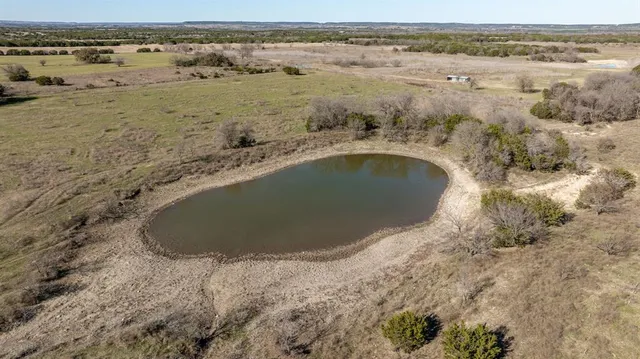 an aerial view of mountain with beach