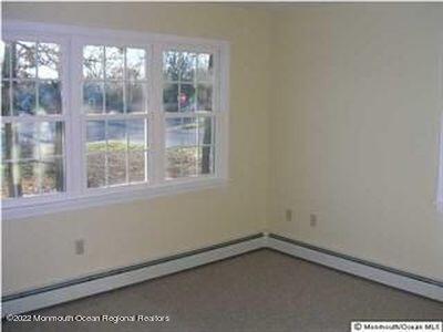 307 Herbertsville Road Brick, NJ 08724 - Photo 7 of 10 a view of a room that has a window in it