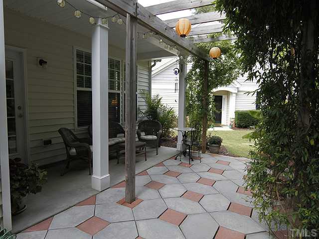 8512 Slabstone Court Raleigh, NC 27613 - Photo 20 of 21 a view of backyard with a patio