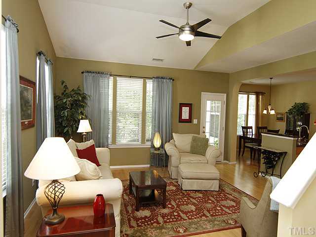 8512 Slabstone Court Raleigh, NC 27613 - Photo 3 of 21 a living room with furniture and a large window
