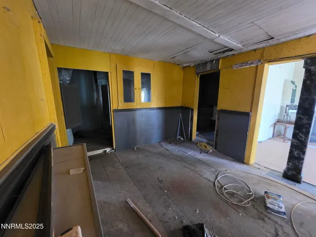 a view of entry way with wooden door