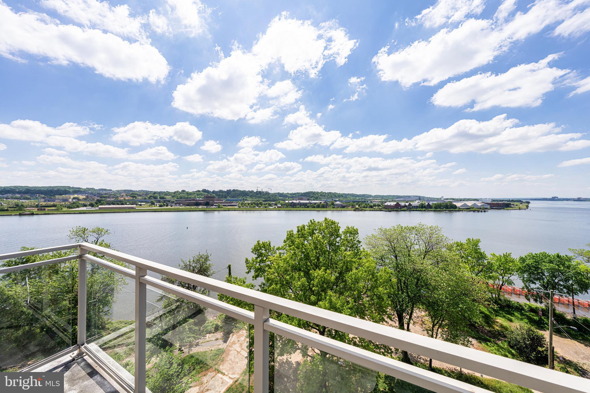 88 V Street Southwest, Unit 808 Washington, DC 20024 - Photo 11 of 47 a view of a lake from a balcony