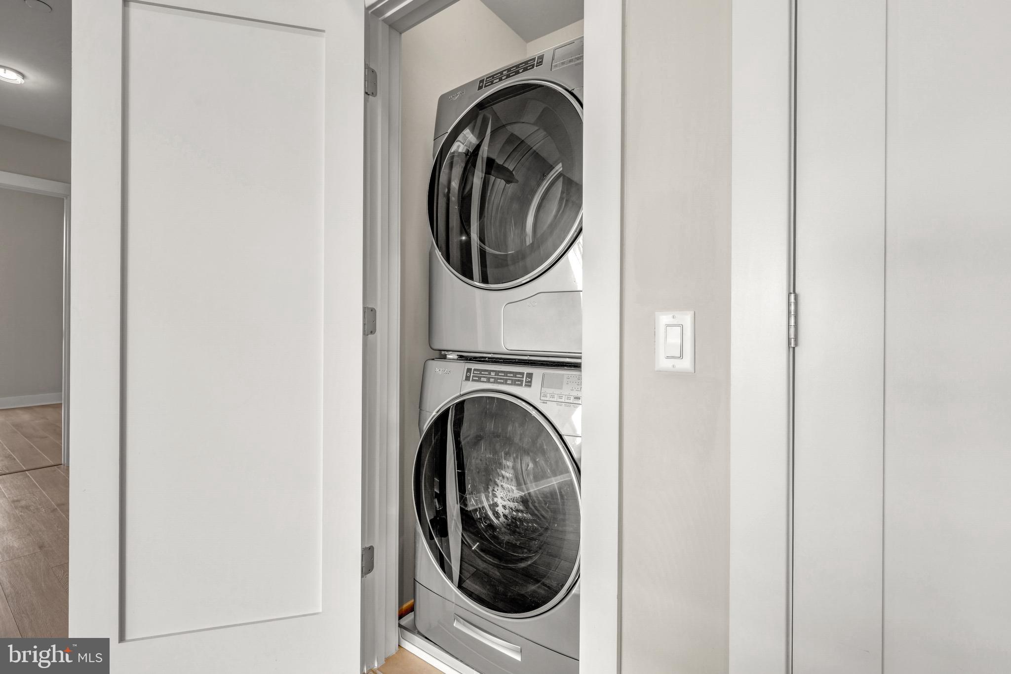 88 V Street Southwest, Unit 808 Washington, DC 20024 - Photo 32 of 47 a utility room with dryer and washer