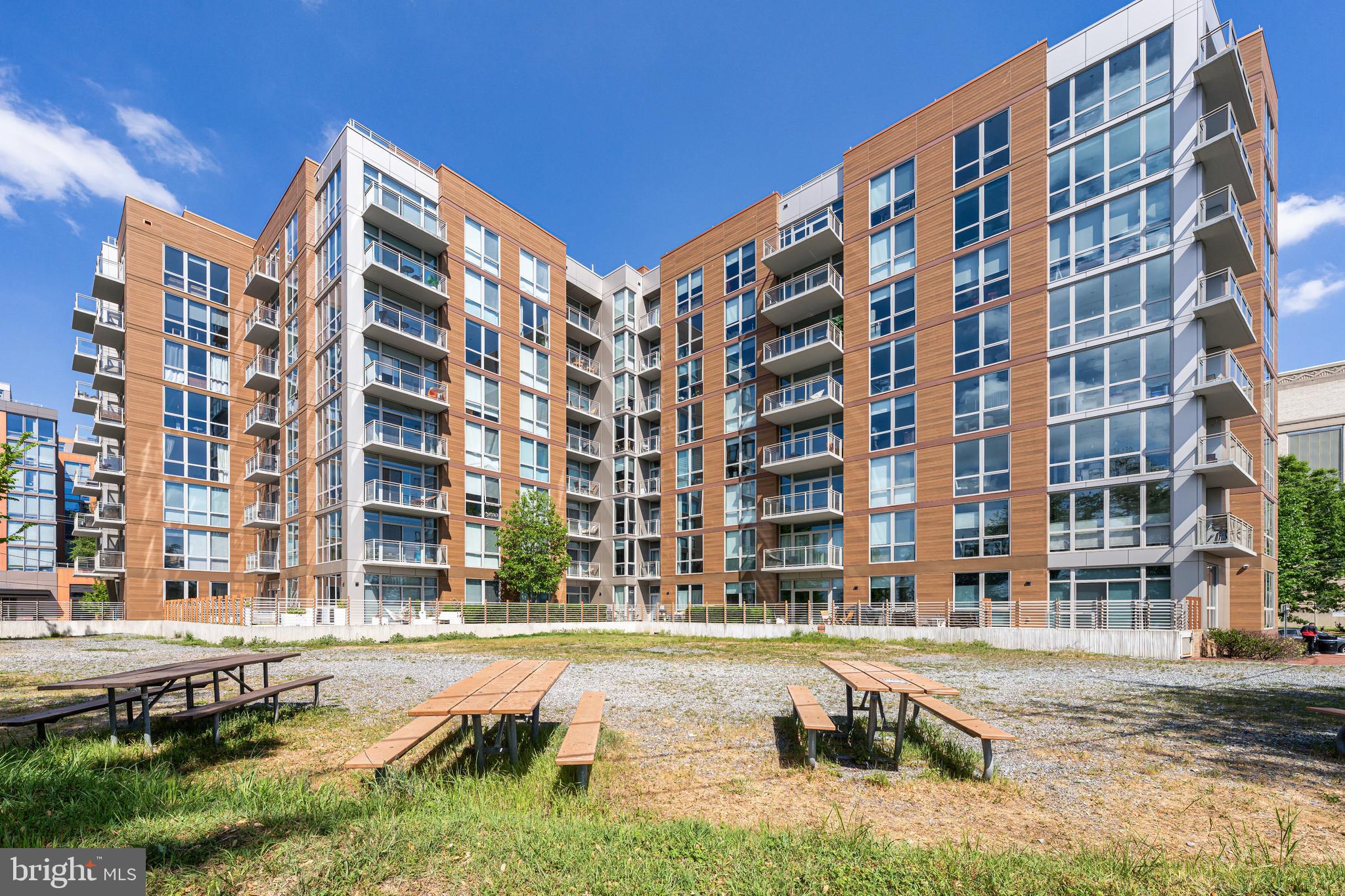 88 V Street Southwest, Unit 808 Washington, DC 20024 - Photo 46 of 47 a view of a building with a swimming pool