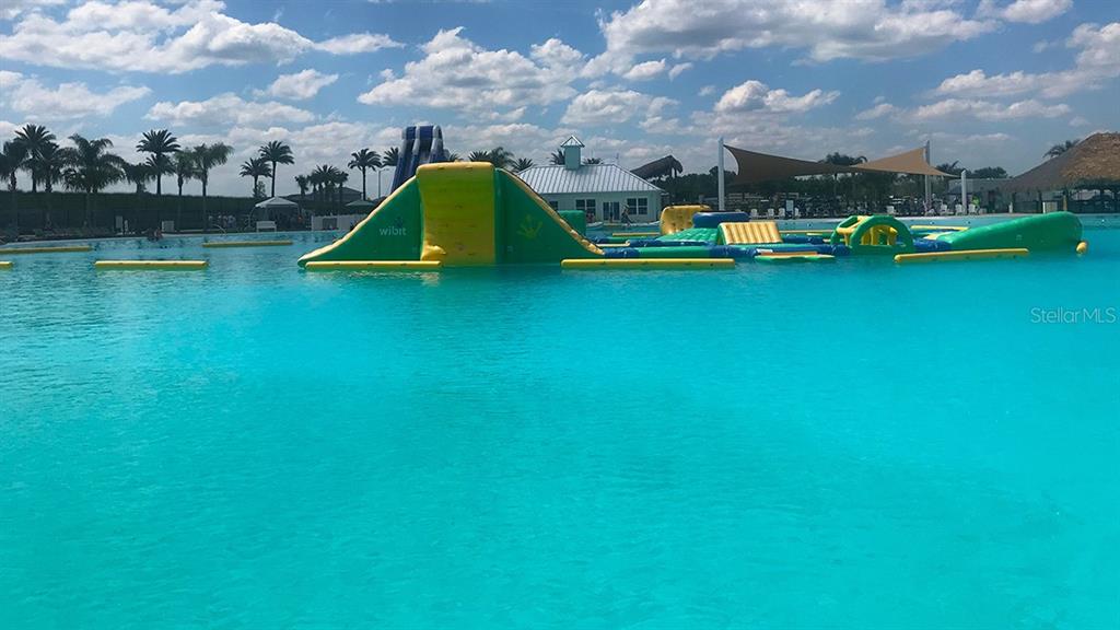 32516 Welling Blade Loop Wesley Chapel, FL 33545 - Photo 35 of 39 a view of a lake with houses