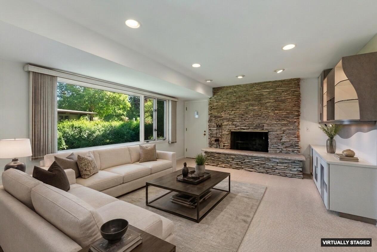 8909 North Maitland Road Bayside, WI 53217 - Photo 9 of 40 digitally staged. natural fireplace.