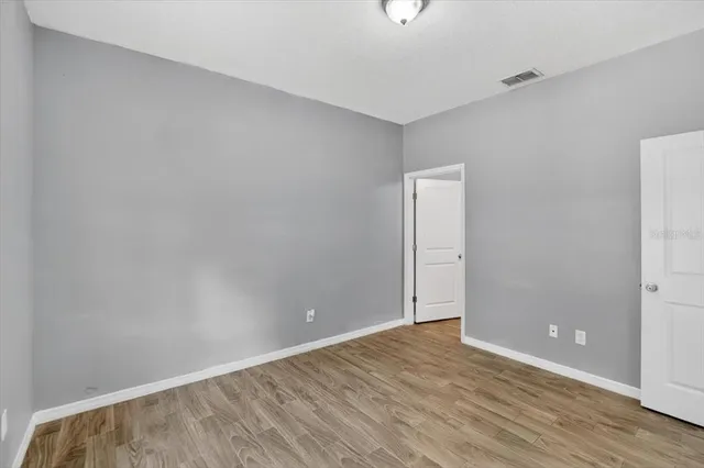 a view of a room with racks on the wall