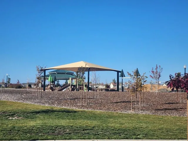 a view of a golf course with a lake