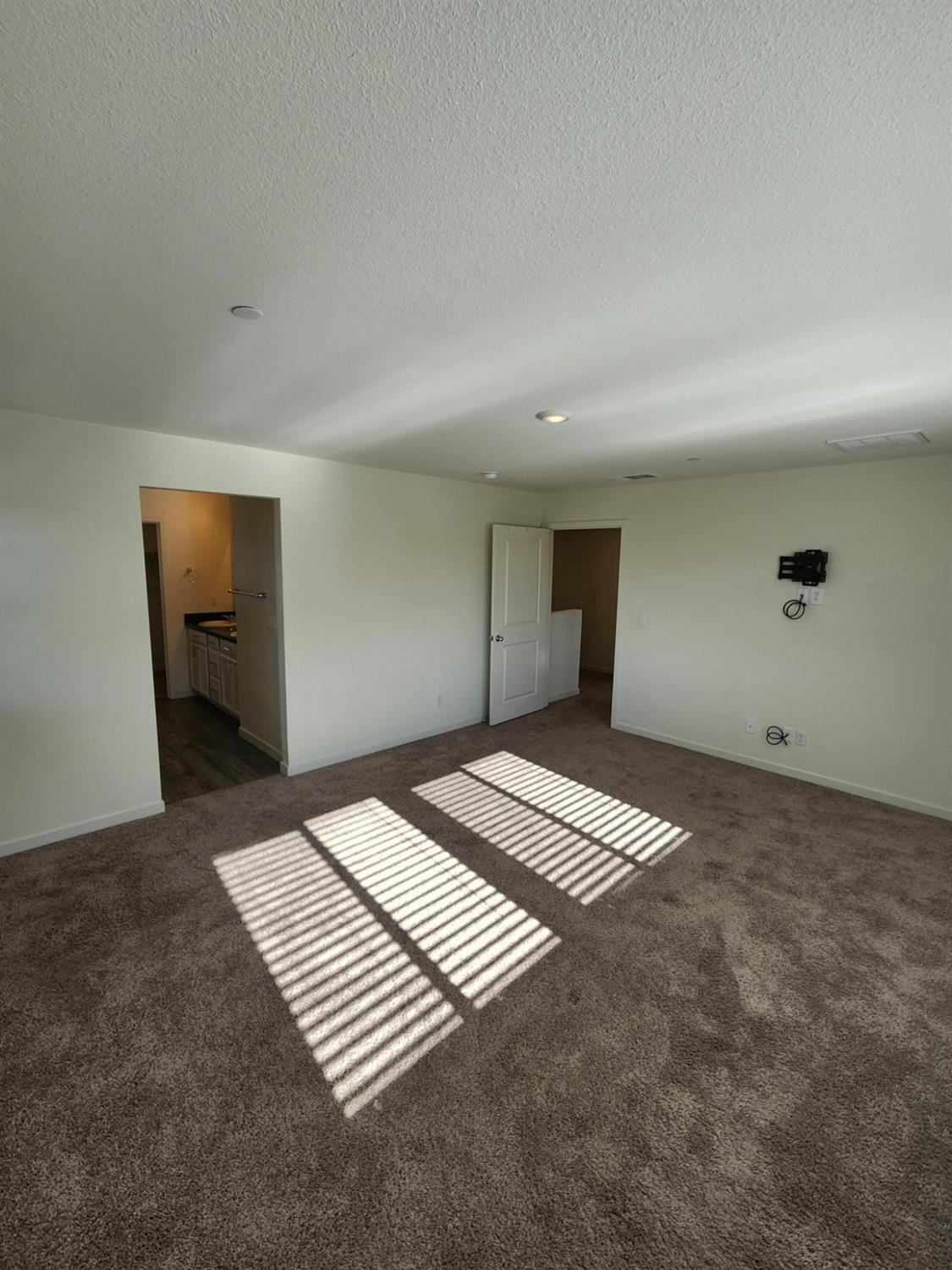 4384 Silver Cedar Lane Sacramento, CA 95834 - Photo 10 of 21 a view of an empty room