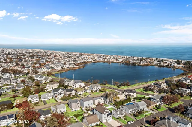 an aerial view of a house with a garden