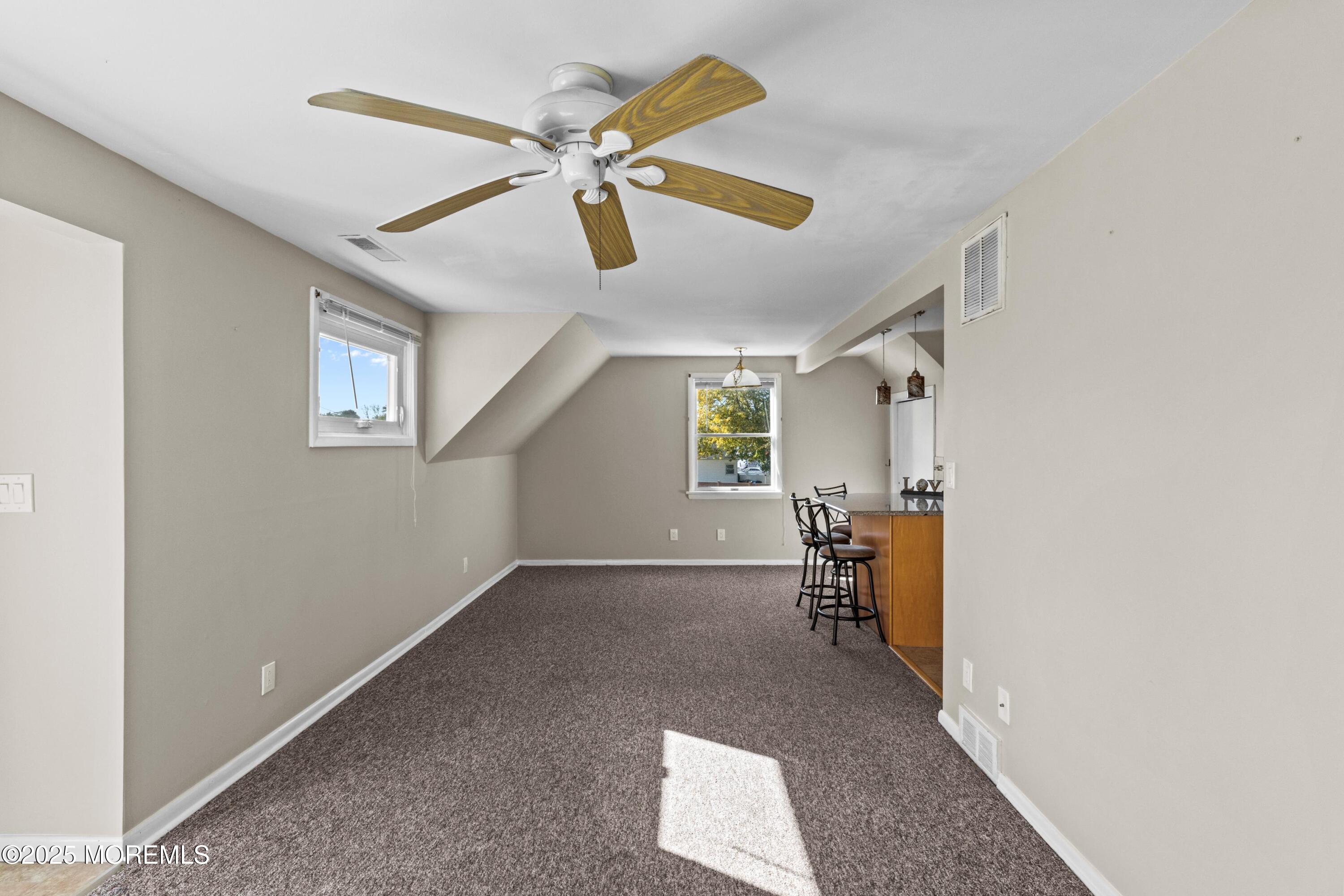 633 North Manetta Drive Point Pleasant, NJ 08742 - Photo 4 of 28 a view of empty room with wooden floor