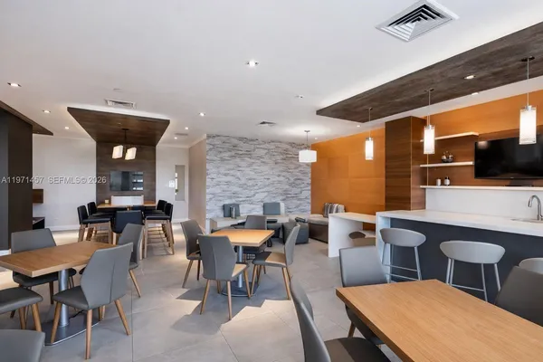 a view of a dining room with furniture