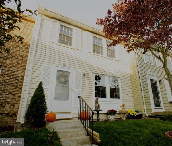 6224 Hillside Road Springfield, VA 22152 - Photo 1 of 8 a front view of a house with a yard