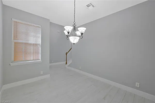 a view of a chandelier in a room