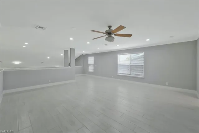 a bathroom with a sink toilet tub and shower