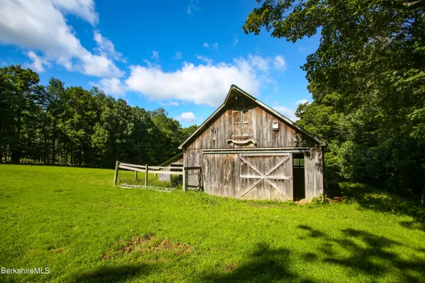 a view of a playground with green space