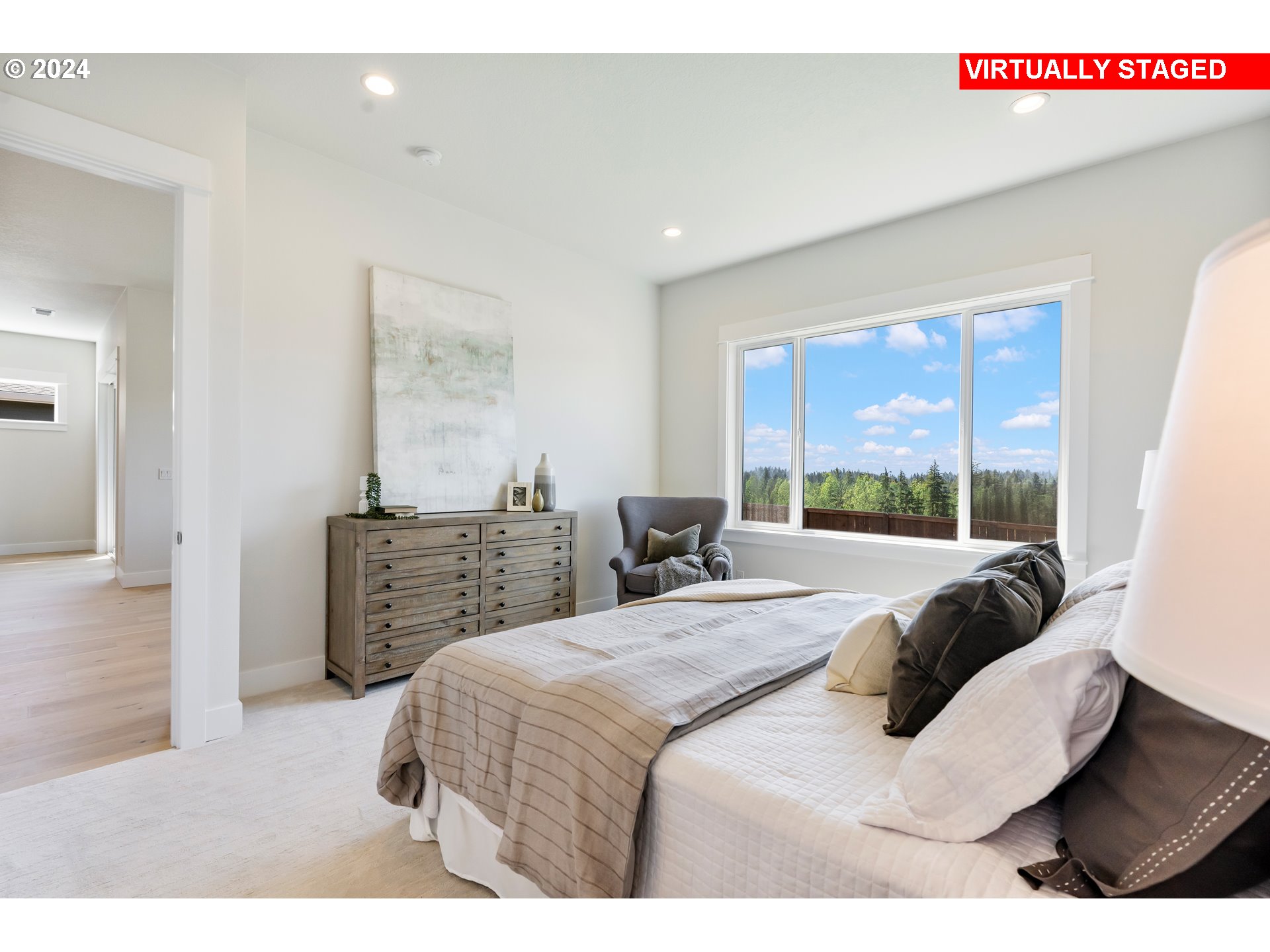 2784 North 49th Avenue Camas, WA 98607 - Photo 13 of 28 a living room with a bed furniture and a large window