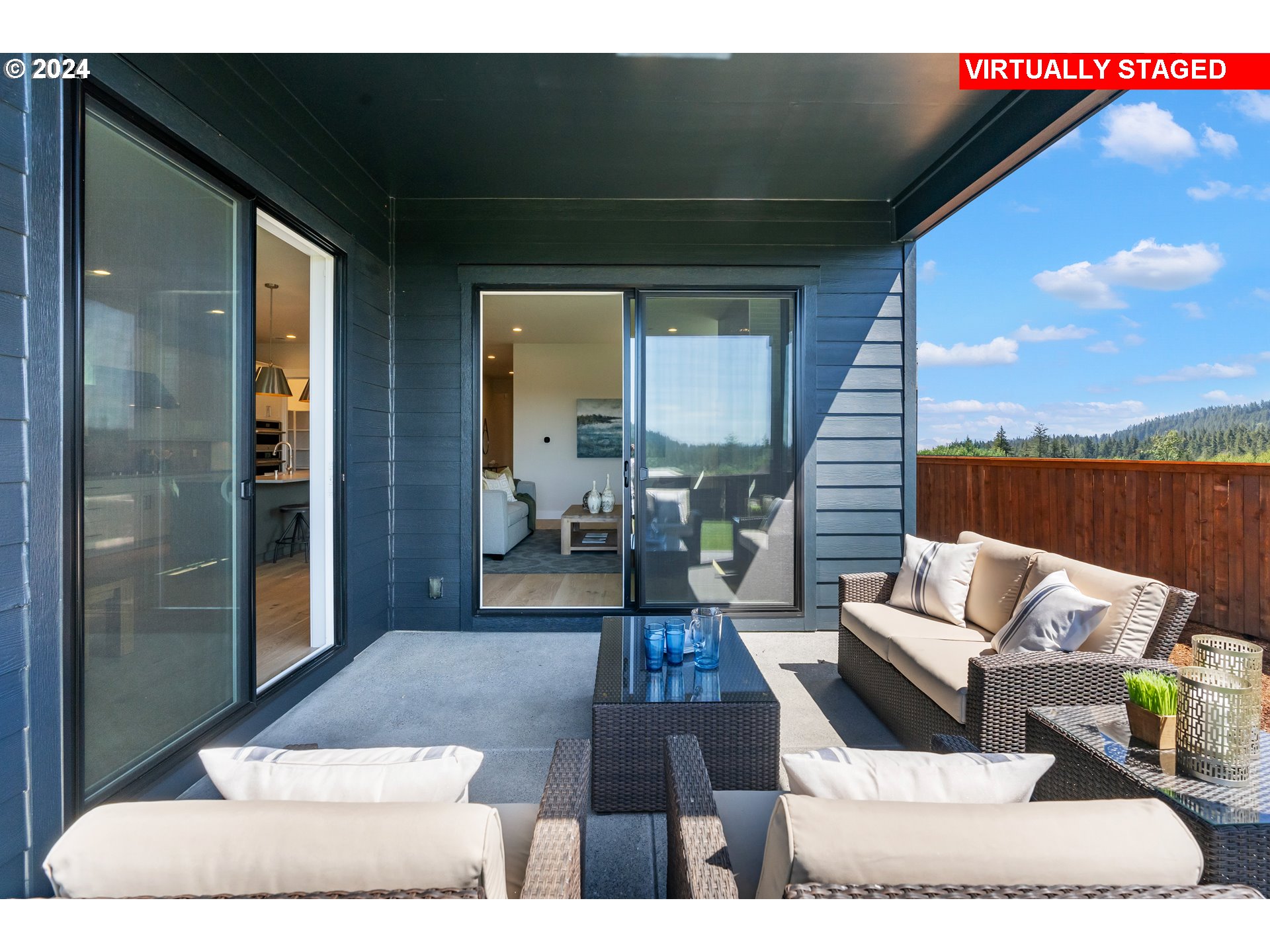 2784 North 49th Avenue Camas, WA 98607 - Photo 20 of 28 a living room with furniture and a floor to ceiling window