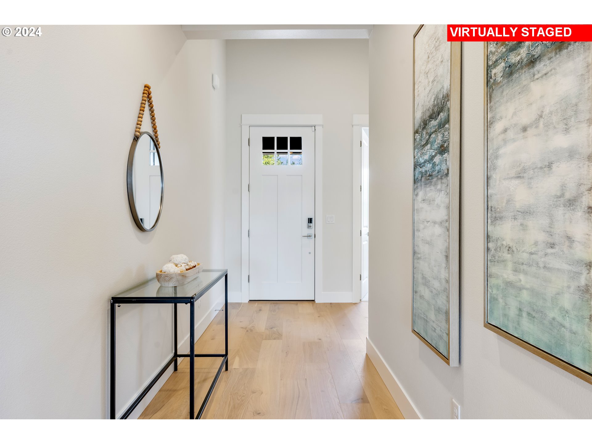 2784 North 49th Avenue Camas, WA 98607 - Photo 4 of 28 a picture of a room with wooden floor and mirror