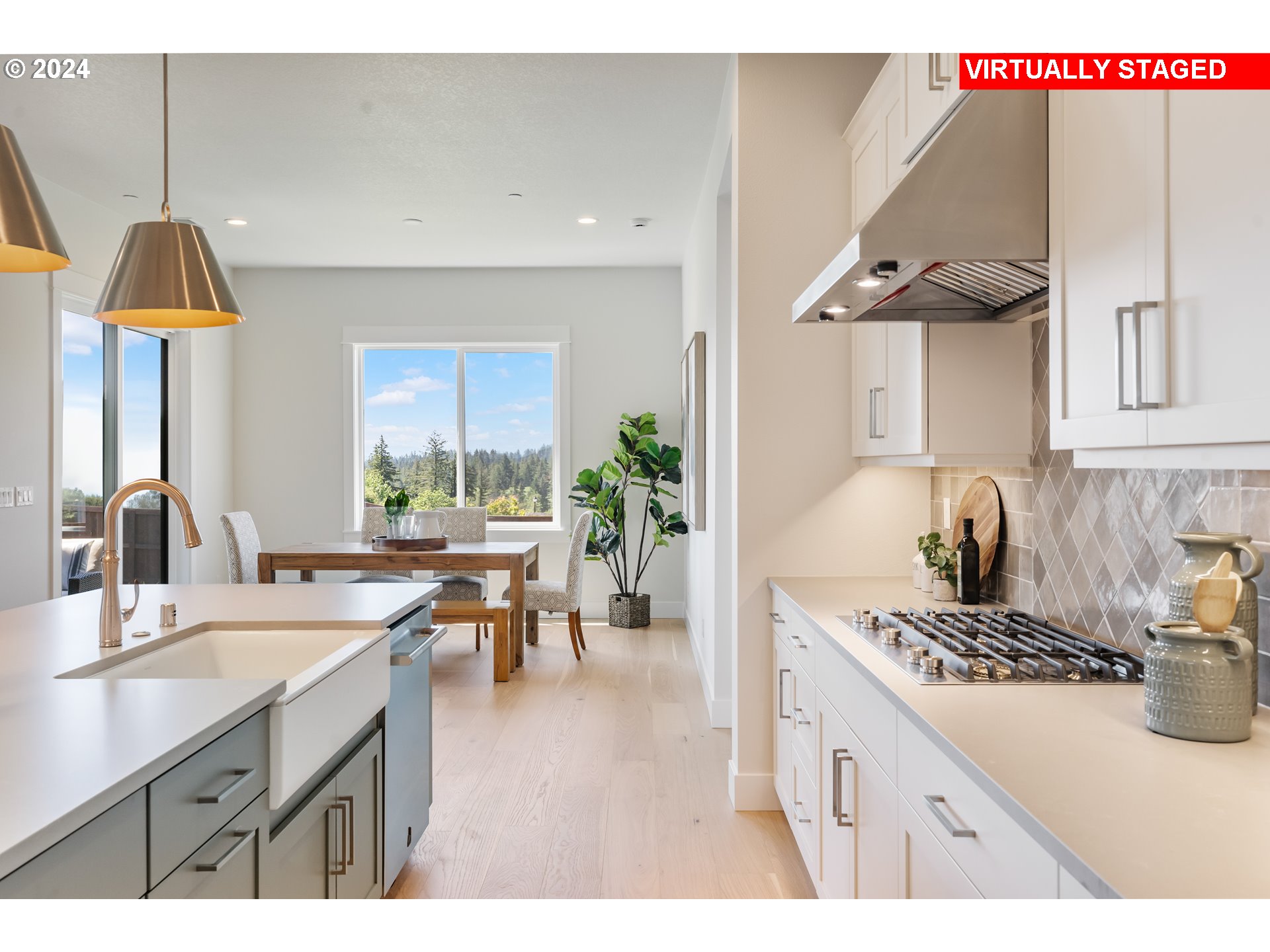 2784 North 49th Avenue Camas, WA 98607 - Photo 8 of 28 a kitchen with a sink a stove and cabinets