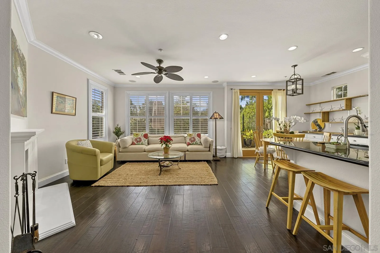 558 Beach Street Encinitas, CA 92024 - Photo 11 of 29 a living room with fireplace furniture and a large window