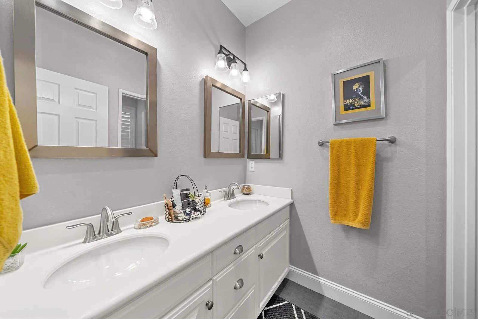 558 Beach Street Encinitas, CA 92024 - Photo 15 of 29 a bathroom with a sink and a mirror
