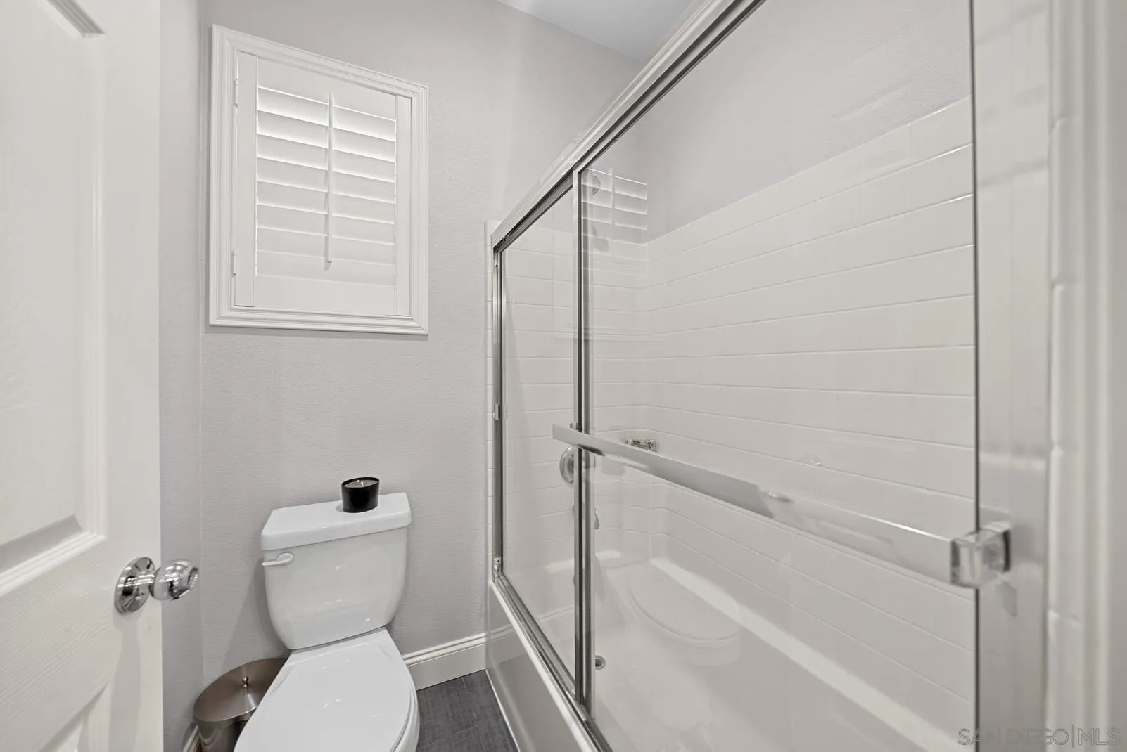 558 Beach Street Encinitas, CA 92024 - Photo 16 of 29 a bathroom with a toilet and a shower
