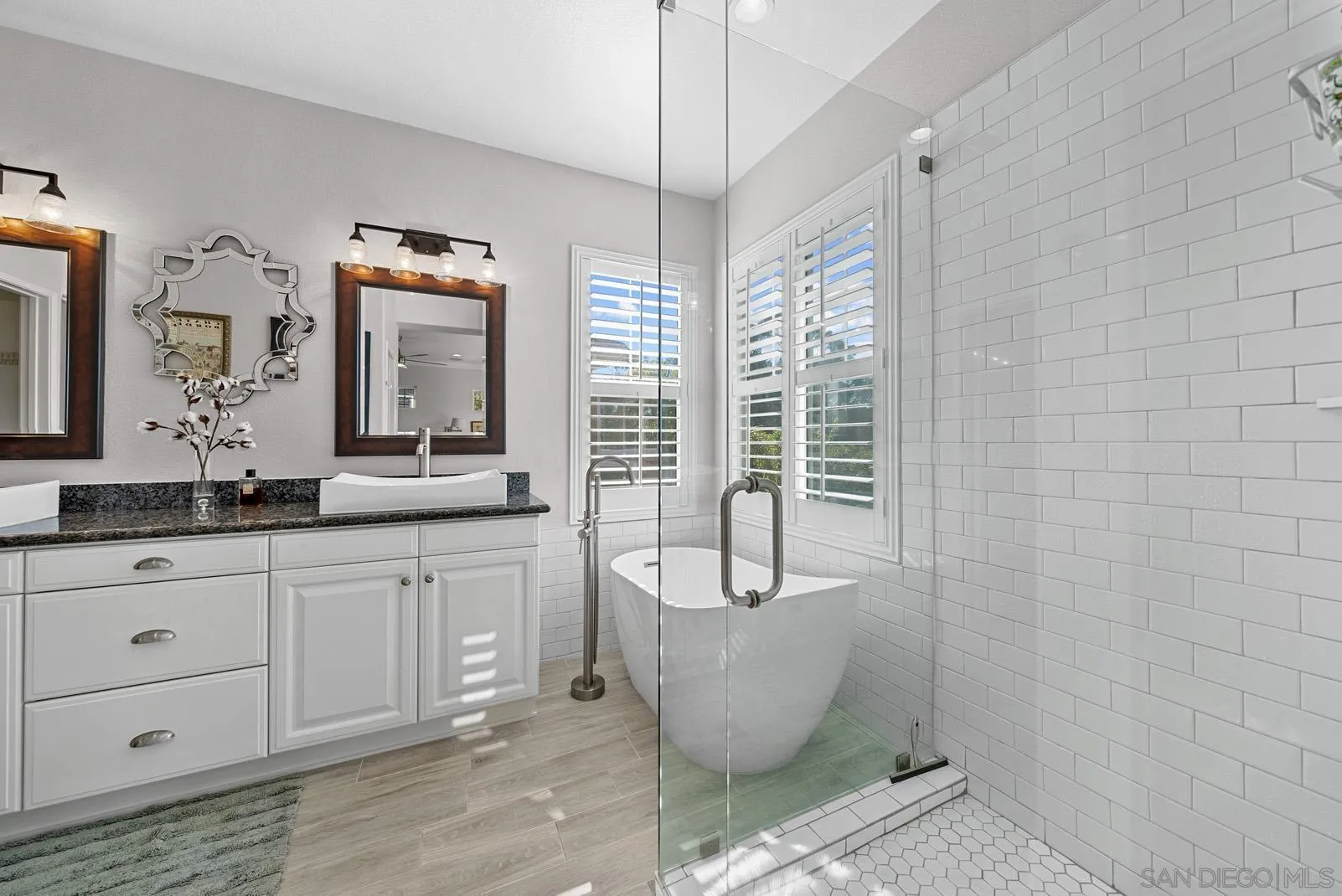 558 Beach Street Encinitas, CA 92024 - Photo 23 of 29 a spacious bathroom with a bathtub and sink