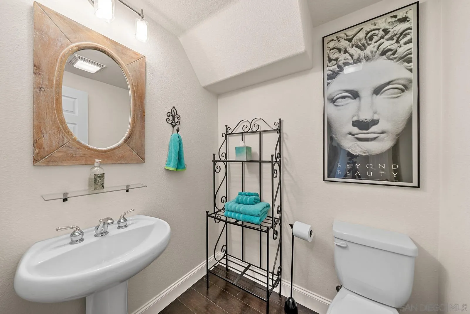 558 Beach Street Encinitas, CA 92024 - Photo 6 of 29 a bathroom with a sink and a mirror