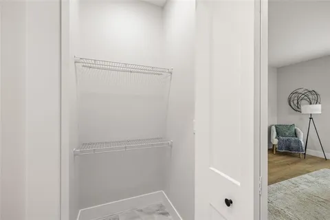 a bathroom with a shower and a sink