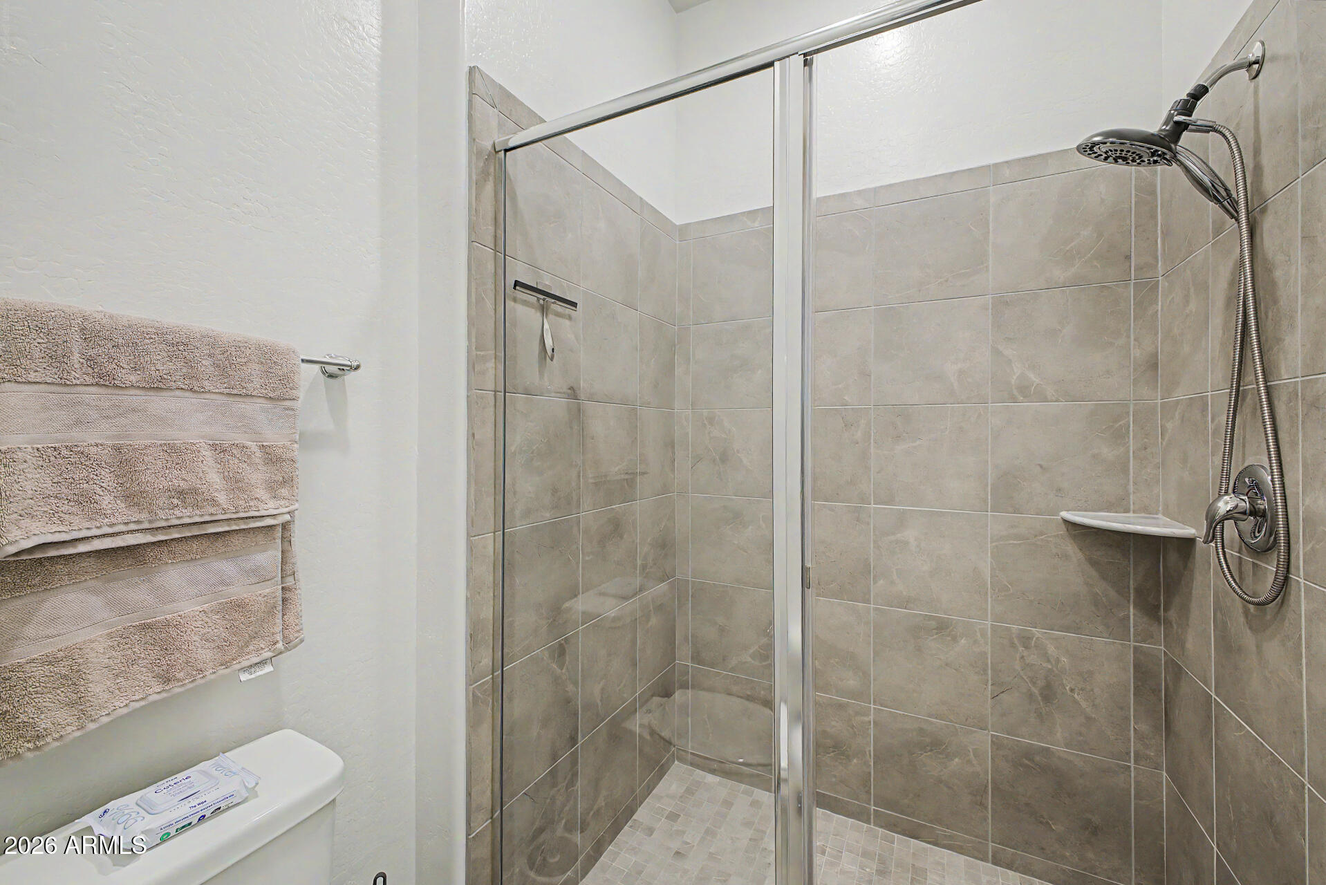 6511 West Steed Ridge Phoenix, AZ 85083 - Photo 26 of 41 a bathroom with a shower and a toilet