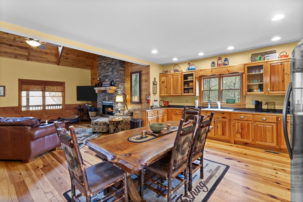 40 Graham Court Ellijay, GA 30540 - Photo 14 of 62 a view of a dining room with furniture window and wooden floor