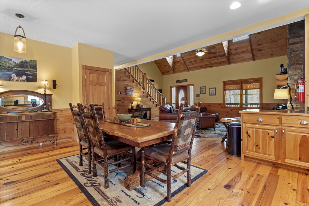 40 Graham Court Ellijay, GA 30540 - Photo 15 of 62 a view of a dining room with furniture and wooden floor