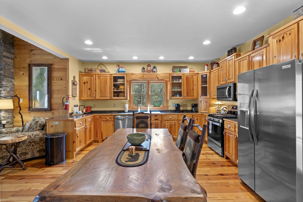40 Graham Court Ellijay, GA 30540 - Photo 16 of 62 a kitchen with lots of counter top space and stainless steel appliances