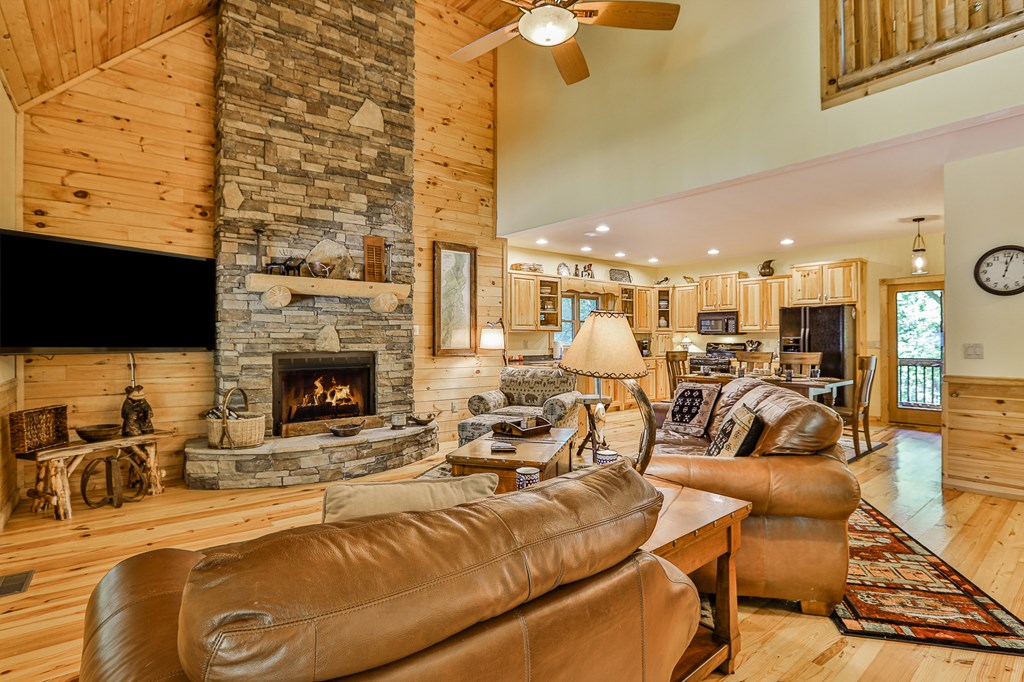 40 Graham Court Ellijay, GA 30540 - Photo 8 of 62 a view of a livingroom with furniture and a fireplace