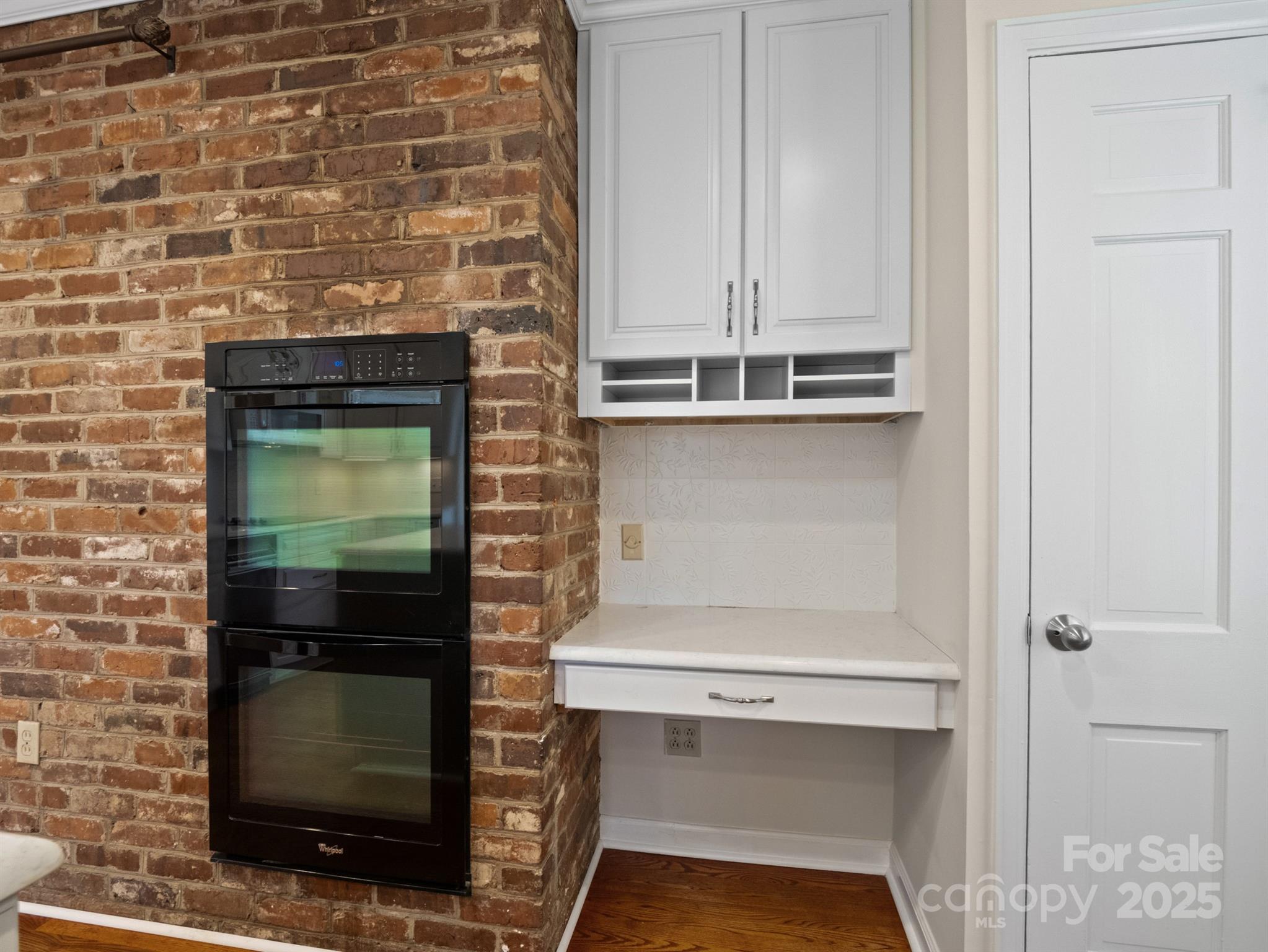 2111 Sagamore Road Charlotte, NC 28209 - Photo 16 of 48 a stove top oven sitting inside of a kitchen