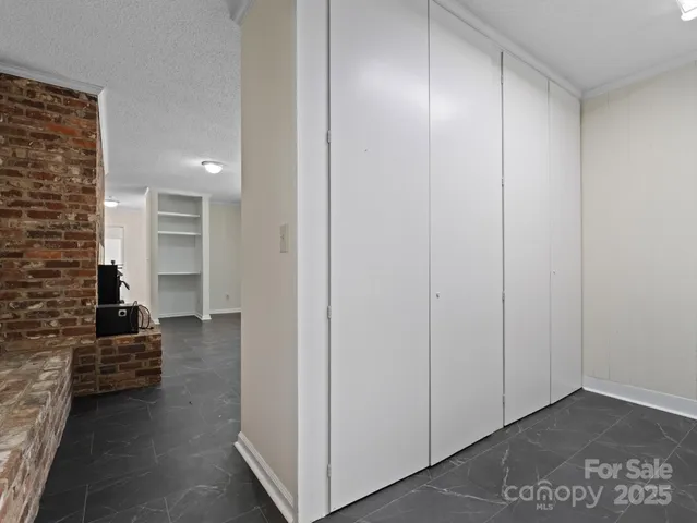 a bathroom with a toilet a sink a vanity and mirror