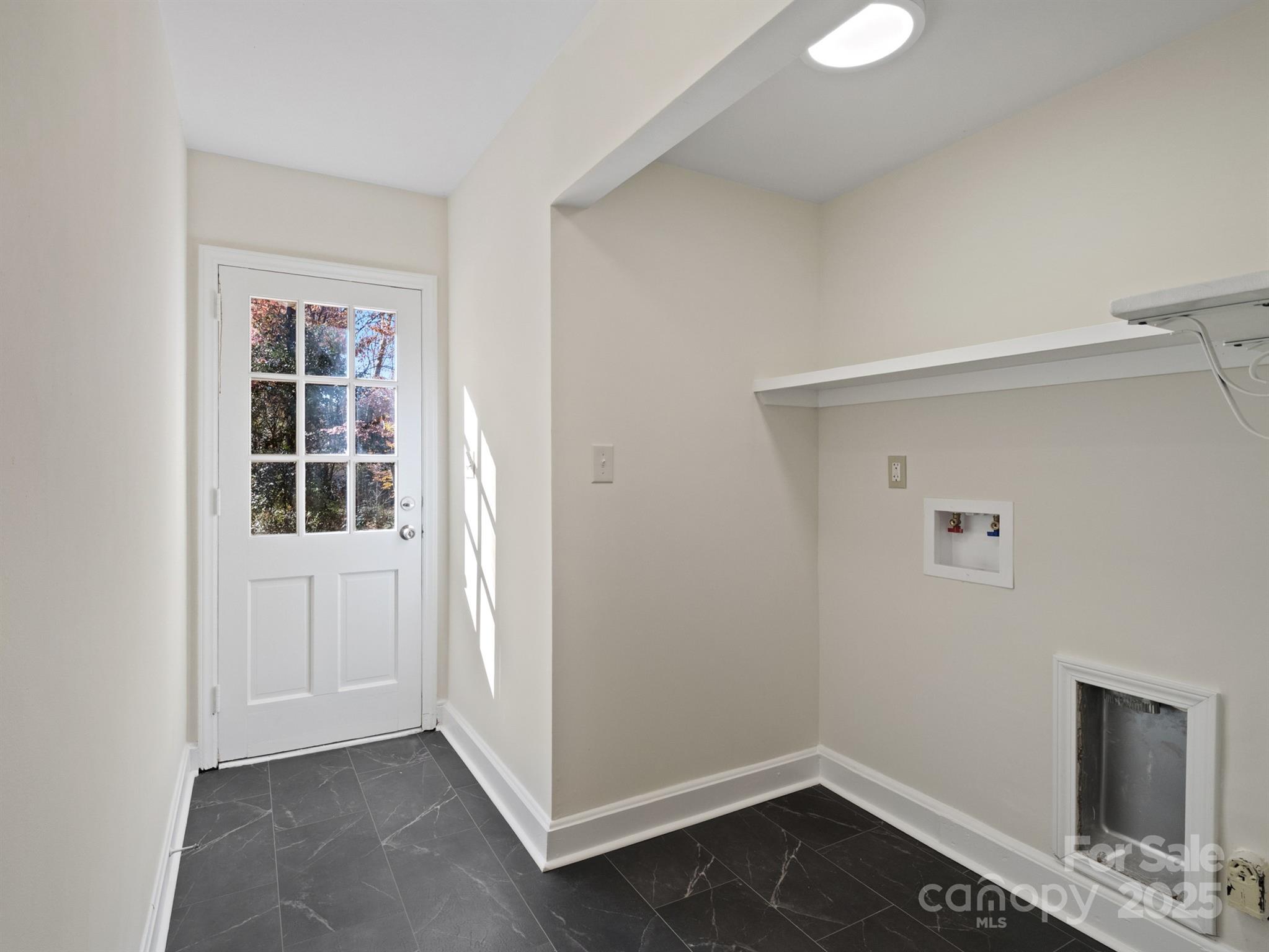 2111 Sagamore Road Charlotte, NC 28209 - Photo 38 of 48 an empty room with windows