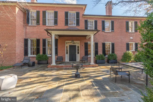 a view of a building with a bench in front of it