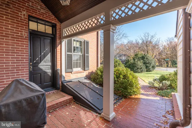 a view of a porch with wooden floor and outdoor space