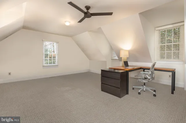 a living room with furniture and window