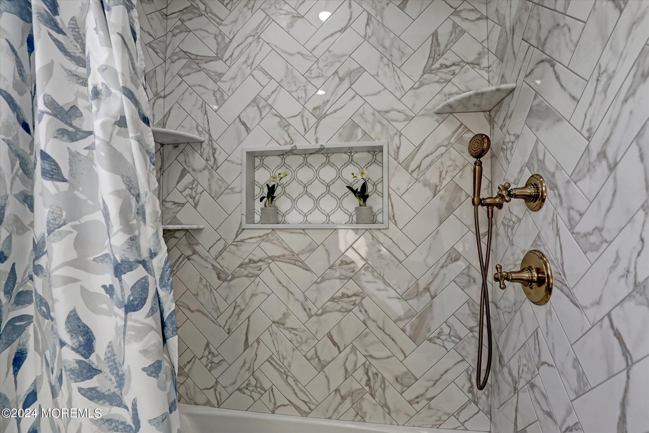 27 Chestnut Ridge Road Holmdel, NJ 07733 - Photo 5 of 35 a bathroom with a bathtub