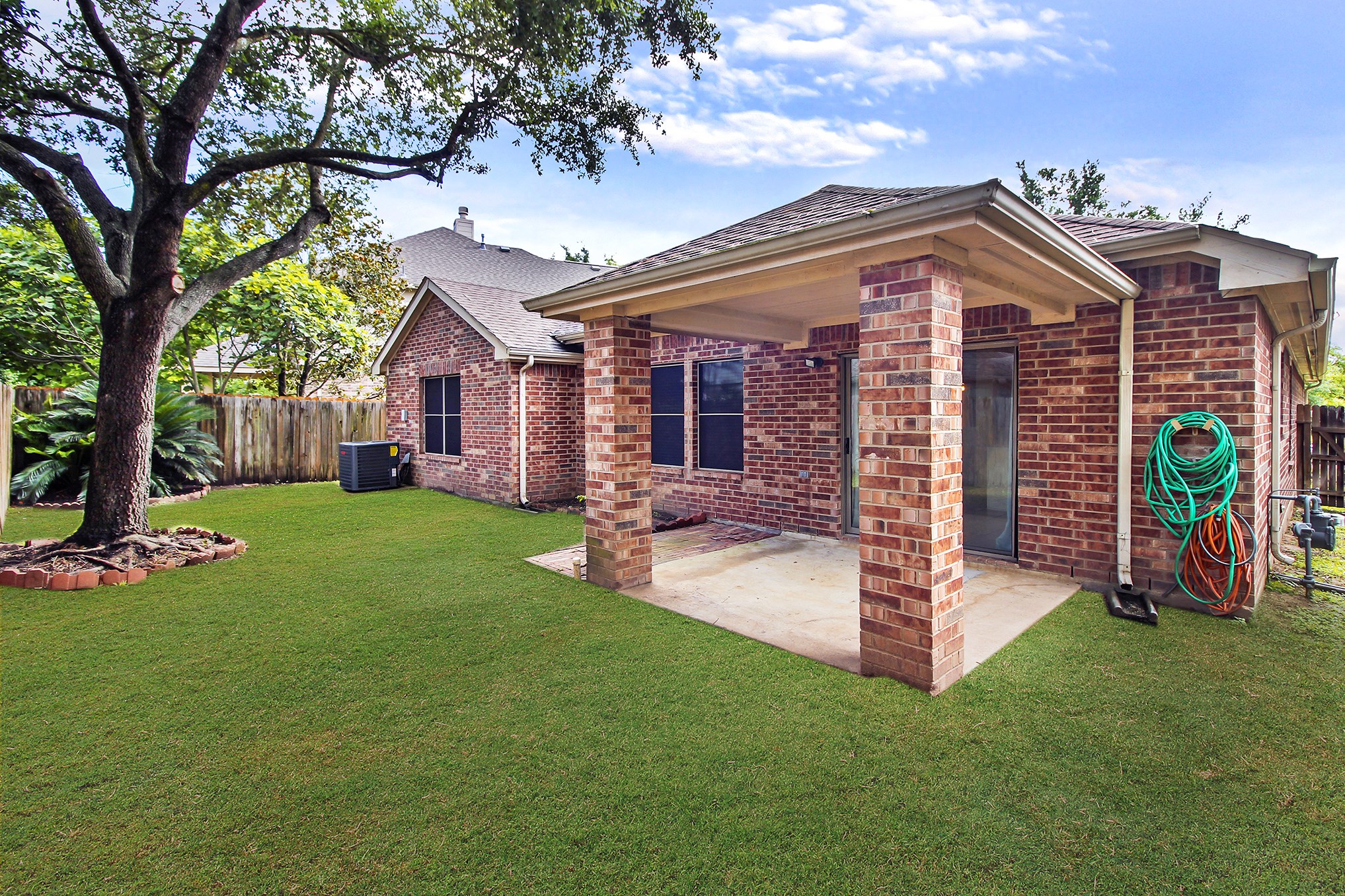 1814 Parkfair Court Katy, TX 77450 - Photo 33 of 36 Another view of the back yard. Notice the all brick exterior of this BEAUTIFUL HOME.