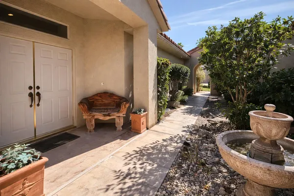 a house view with a backyard space