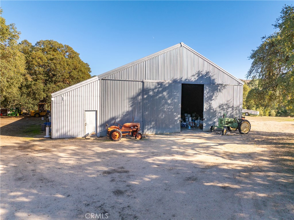 77620 Lowes Canyon Road San Miguel, CA 93451 - Photo 15 of 56 a view of a house with backyard and a tree